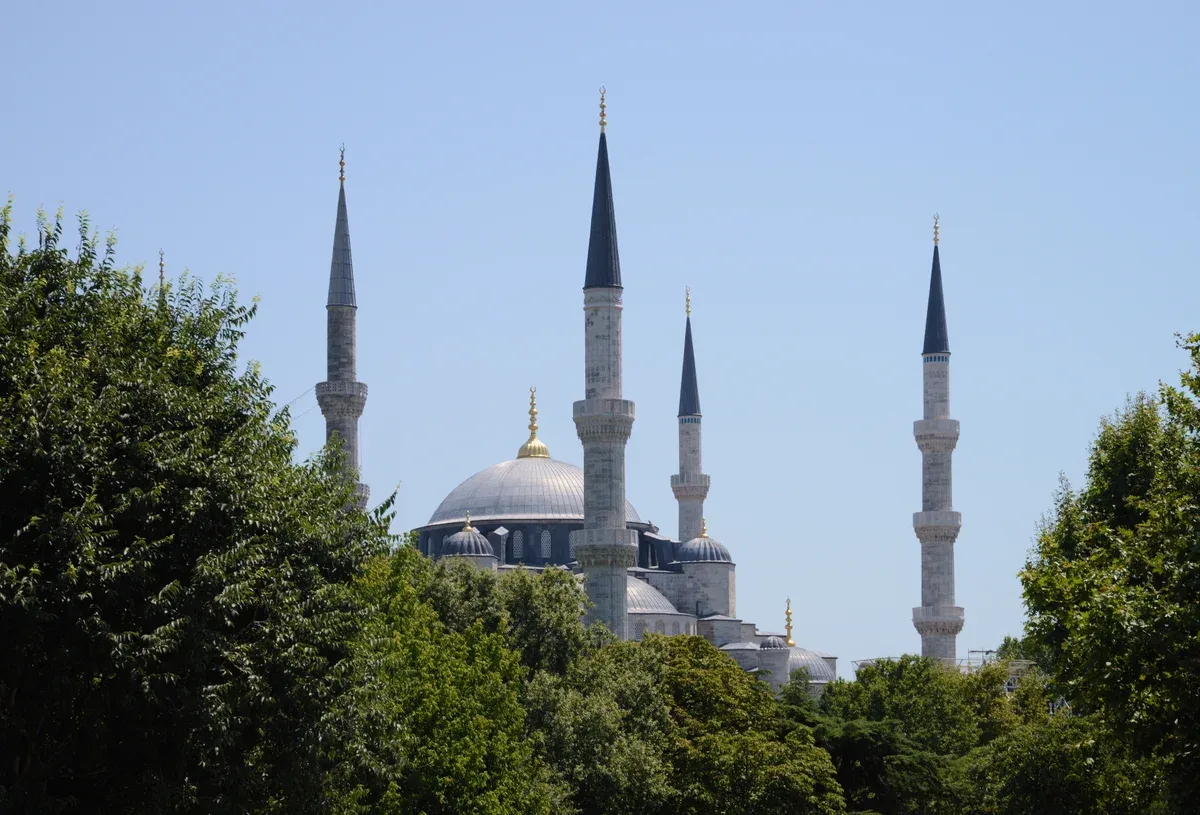 Hagia Sophia and its four minarets above the trees of Sultanahmet, the first stop on most Turkey tour packages from Istanbul