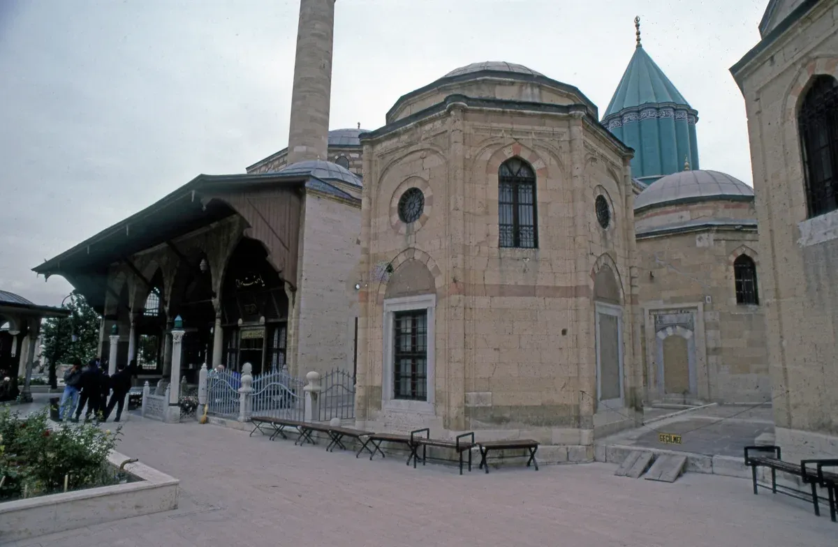 The courtyard and turquoise dome of the Mevlana Museum in Konya, on a 8 day Turkey tour